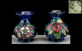 William Moorcroft Signed Pair of Small Tube lined Bulbous Vases ( 2 ) ' Orchids ' Design on Blue