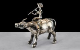 A Fine Chinese Ching Dynasty Antique Silver Model of a Water Buffalo with A Man Riding on Its Back,