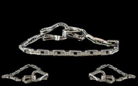 A 9ct White Gold Diamond Bracelet approx 1ct of diamonds. Length 6 1/2 inches.