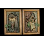 Pair of Austrian Cold Painted Terracotta Wall Plaques, depicting an Arab playing a guitar,