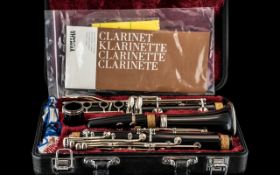 Yamaha Clarinet In Black Fitted Case, with a Red Plush Lining.