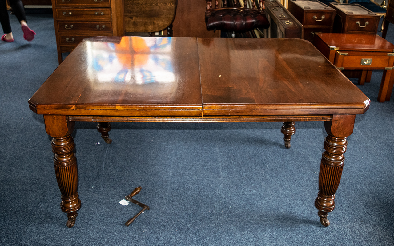 Edwardian Walnut Drawer-Leaf Dining Table, with a wind-out mechanism with two leaves, supported on - Image 3 of 3