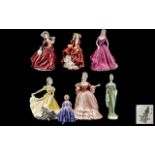 A Collection of Porcelain Lady Figures 7 in total to include,