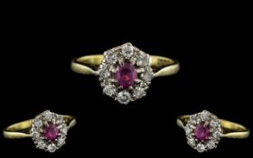 18ct Gold - Attractive Ruby and Diamond Set Cluster Ring. Marked 18ct to Interior of Shank.