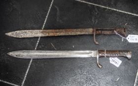German Model 1898/05 Bayonet, with saw back removed. No scabbard, together with one other.