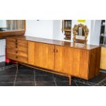 Swedish Designer Teak Credenza of Large Elegant Size constructed with a bank of five drawers to