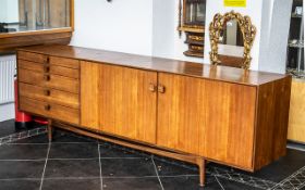 Swedish Designer Teak Credenza of Large Elegant Size constructed with a bank of five drawers to