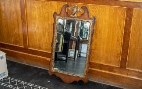 Superior Empire Style Wall Mirror of wooden construction with ormolu decoration,