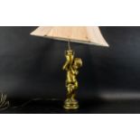 A Gold Cherub Style Table Lamp with Shade. Please See Photo.