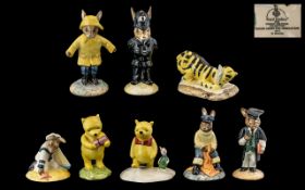 Royal Doulton 'Winnie the Pooh' Collection figures, comprising Pooh 'The More it Snows,