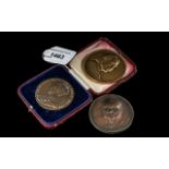Three Bronze Medallions, George V, Albert Einstein and Winston Churchill.