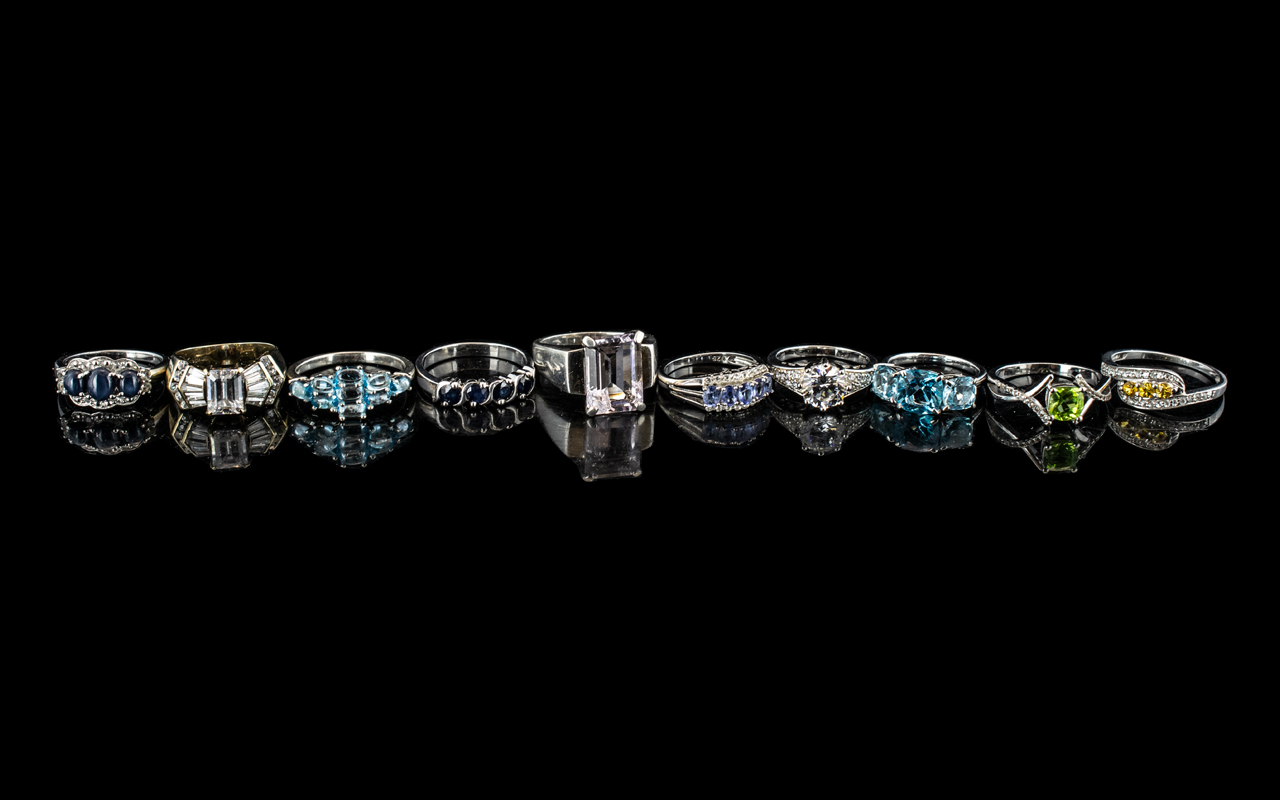 Collection of Ten Silver Rings, various coloured stones, various designs.