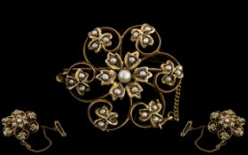 Victorian Period Attractive 9ct Gold Open worked Seed Pearl Set Brooch with Safety Chain.