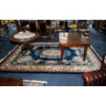 Large Wool Carpet/Rug, dark blue ground with coral/beige/green shades,