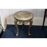 A Small Circular Onyx Table on brass frame, height 17'' x 14'' diameter.