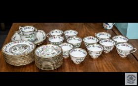 A Royal Albert Part Teaset comprising 12 cups, 12 saucers, 12 side plates,