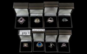 A Collection of Eight Silver Dress Rings,