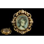 Antique Pinchbeck Brooch, with portrait of an elegant lady, in ornate scroll gold metal surround,
