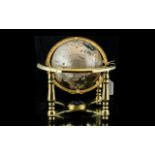 Gem Globe - Mother of Pearl & Gemstone cream and gold gemstone globe on brass stand.