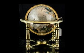 Gem Globe - Mother of Pearl & Gemstone cream and gold gemstone globe on brass stand.