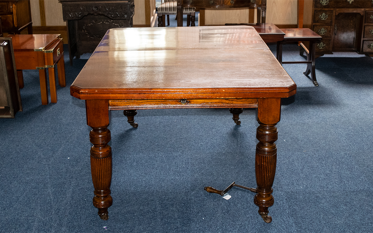 Edwardian Walnut Drawer-Leaf Dining Table, with a wind-out mechanism with two leaves, supported on - Image 2 of 3