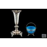 A Victorian Silver Plated Sugar Bowl with blue glass liner in the Adam's style.