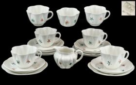 Shelley 19 piece Teaset later painted with floral sprigs.