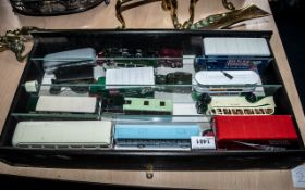 A Small Showcase containing 15 Diecast Models, coaches, trams and trucks.