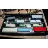 A Small Showcase containing 15 Diecast Models, coaches, trams and trucks.