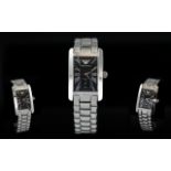 Emporio Armani Ladies Classic Silver Tone and Black Dial Stainless Steel Wrist Watch, model no. AR