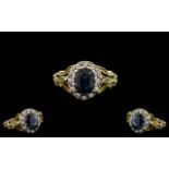 Antique Period - Attractive 18ct Gold and Platinum Diamond and Blue Sapphire Set Cluster Ring.