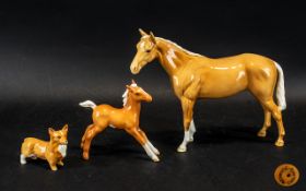 Collection of Beswick Animals comprising a large 8" tall horse (chip to ear), a 5" foal, a 3.