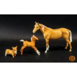 Collection of Beswick Animals comprising a large 8" tall horse (chip to ear), a 5" foal, a 3.