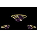 18ct Yellow Gold - Attractive Two Stone Amethyst and Diamond Set Dress Ring.