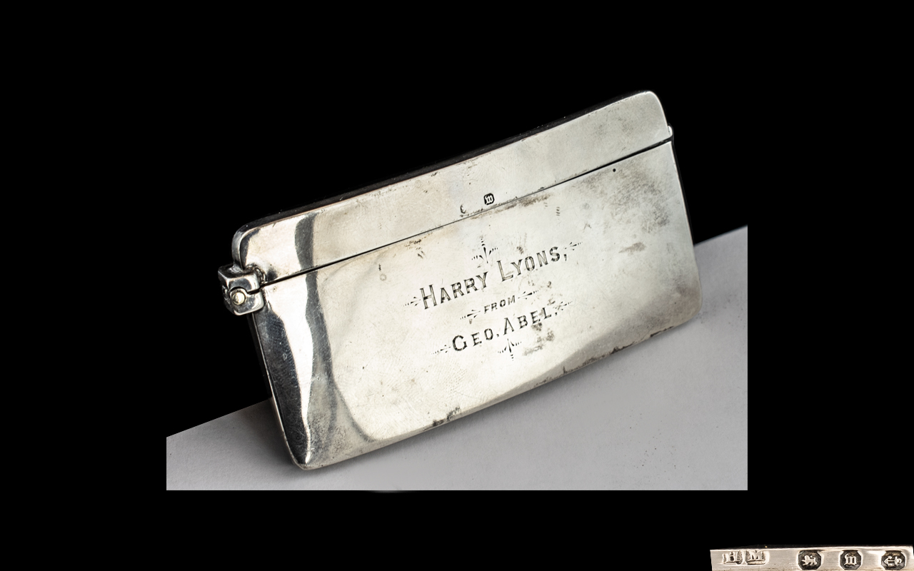 Silver Card Case, with inscription to front 'Harry Lyons from Geo. Abel. Measures 3.5" x 1.75".