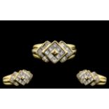 18ct Yellow Gold - Attractive Princess Cut and Baguette Cut Diamond Set Ring of Excellent