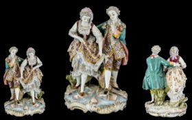 A German Porcelain Figural Group of a courting couple finely painted, with lacework on a rocky base,