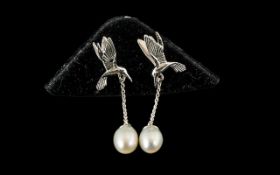 Cultured Fresh Water Pearl 'Bird in Flight' Drop Earrings, each solitaire pearl suspended from a