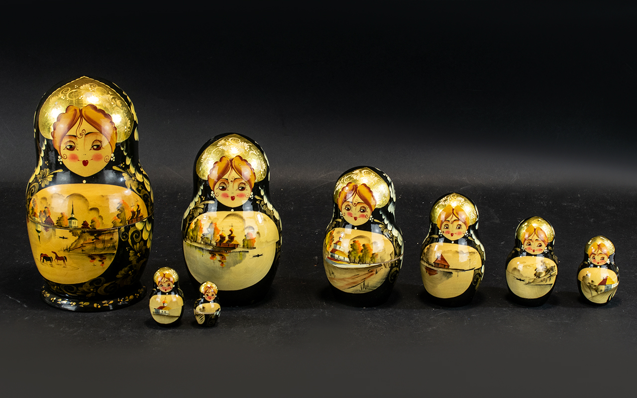 Set of 10 Russian Matryoshka Dolls, signed to the bottom with Russian markings. 10" tall.