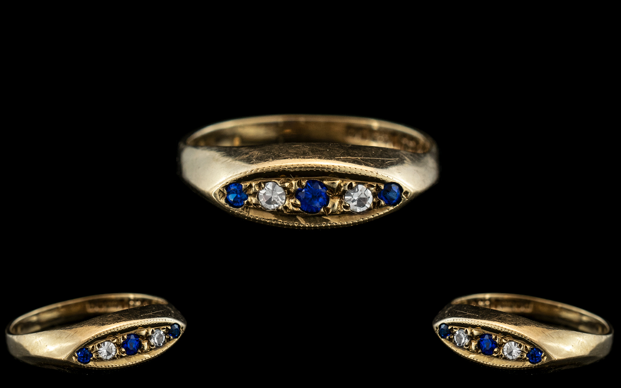 Ladies - Attractive 9ct Gold 5 Stone Diamond and Sapphire Set Dress Ring. Full Hallmark for 9.375.