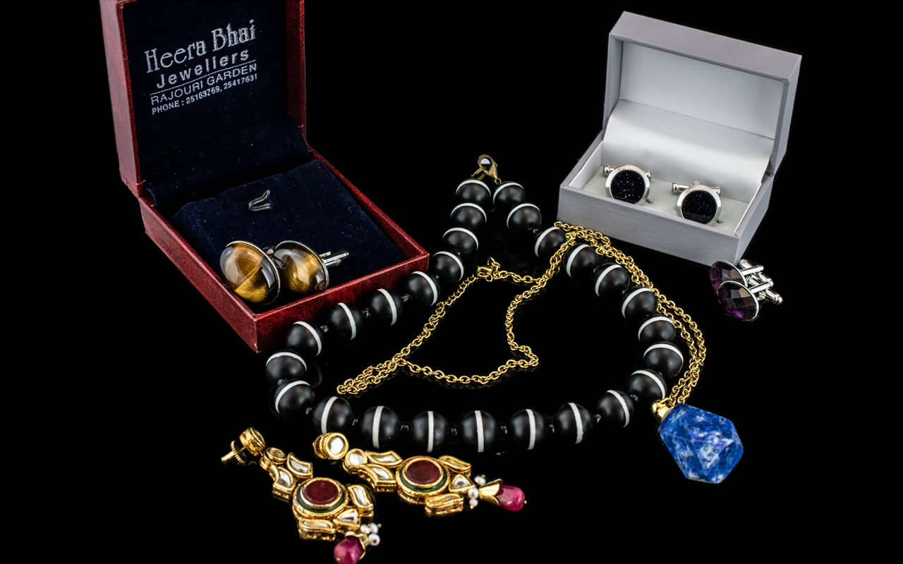 Collection of Costume Jewellery, to include Tiger's Eye cufflinks, Amethyst set cufflinks, necklace,