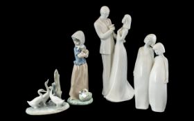 Two Royal Doulton Figures 'Congratulations' depicting a bride and groom, 11" tall, No. HN3351, 1991.