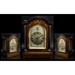 A 20th Century Mantle Clock, mahogany cased with inlay work, silvered dial with Roman numerals,