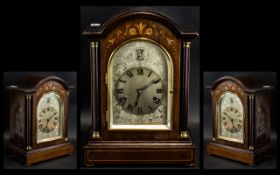 A 20th Century Mantle Clock, mahogany cased with inlay work, silvered dial with Roman numerals,