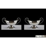 Edwardian Period Pair of Twin Handle Sterling Silver Salts of Trophy Form and Small Proportions.