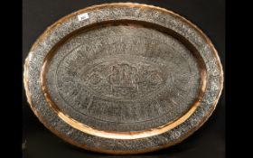 Middle Eastern Silvered on Copper Embossed Large Oval Tray/Charger. The centre with figures and