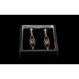 9ct Gold Amethyst Set Drop Earrings. Earrings of Good Quality and Design Throughout. 3 cm Drop.