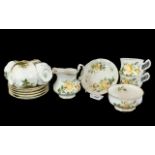 Royal Standard Bone China Tea Set, comprising six cups, six saucers, a milk jug and sugar bowl,