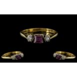 18ct Gold Antique Diamond Dress Ring Set with A Central Calibre Cut Red Stone Between Two Round Cut