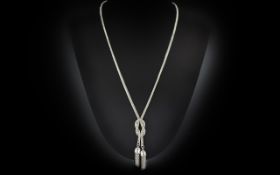 A Fine Quality Ladies Sterling Silver Necklace / Chain with Knot and Double Tassel Drop Design.